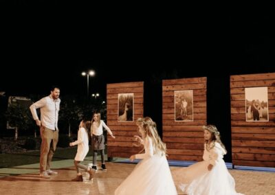 kids dancing on a parquet dance floor at wedding