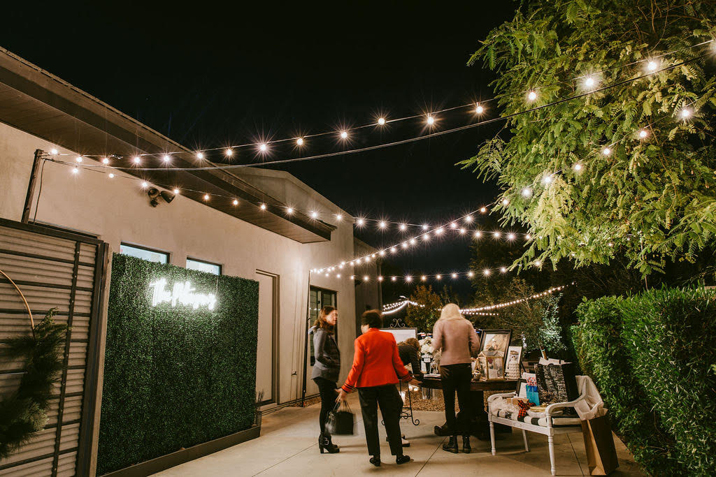 string lights outside backyard wedding